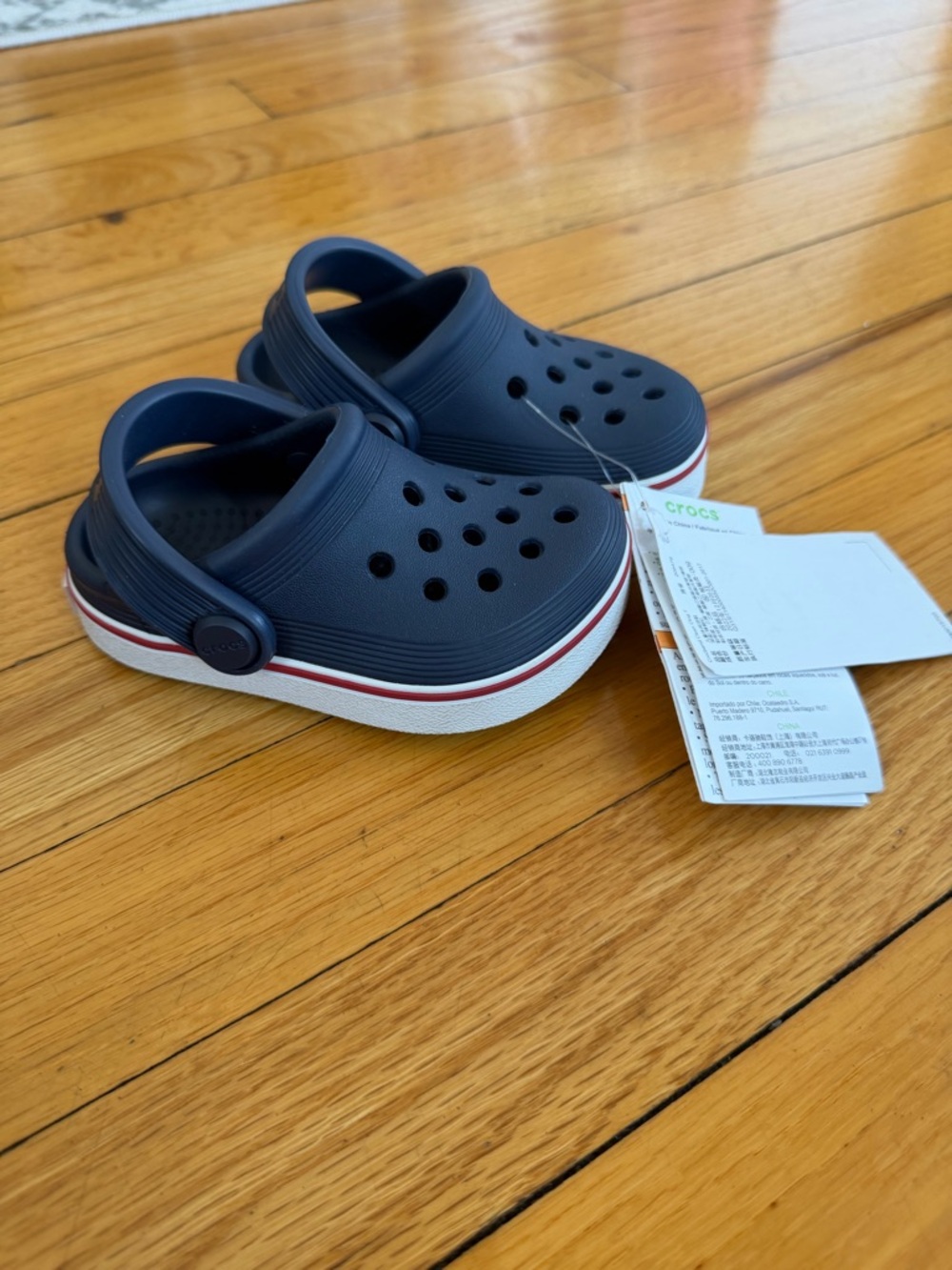 CROCS Kids Navy Clog with White and Red Stripe Sole